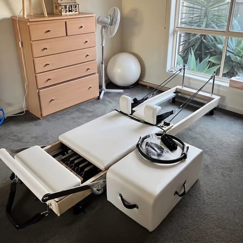 A Studio Reformer set up in a bedroom